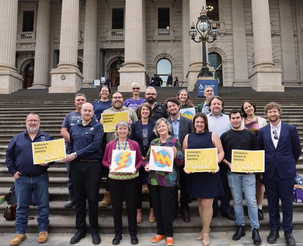 Our staff and volunteers standing with unions and welfare advocates after meeting with MPs at Parliament.