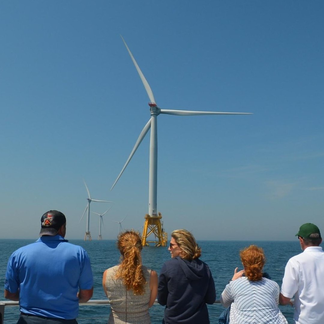 ''People look out at the Block Island Wind Farm off the coast of Rhode Island.''