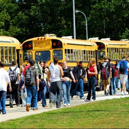 Students entering school buses