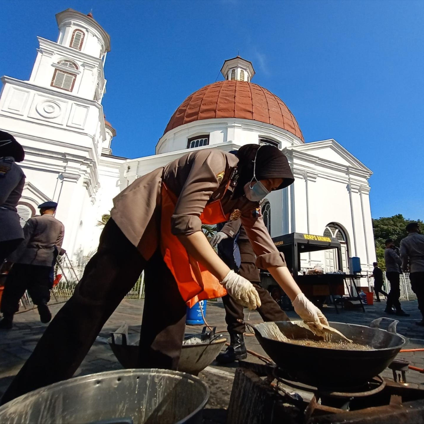 Cooking in front of a church